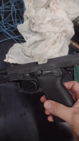 pistola apreendida na ação